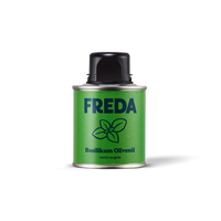 Grüne Dose mit der Aufschrift "FREDA Basilikum Olivenöl extra vergine" und einem Basilikumsymbol.