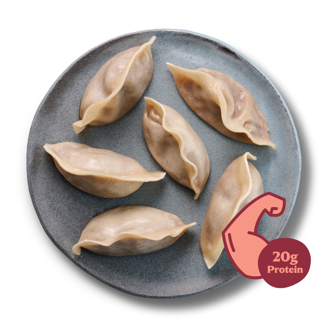 Ein Teller mit sechs Teigtaschen und einem Symbol, das 20 g Protein zeigt.