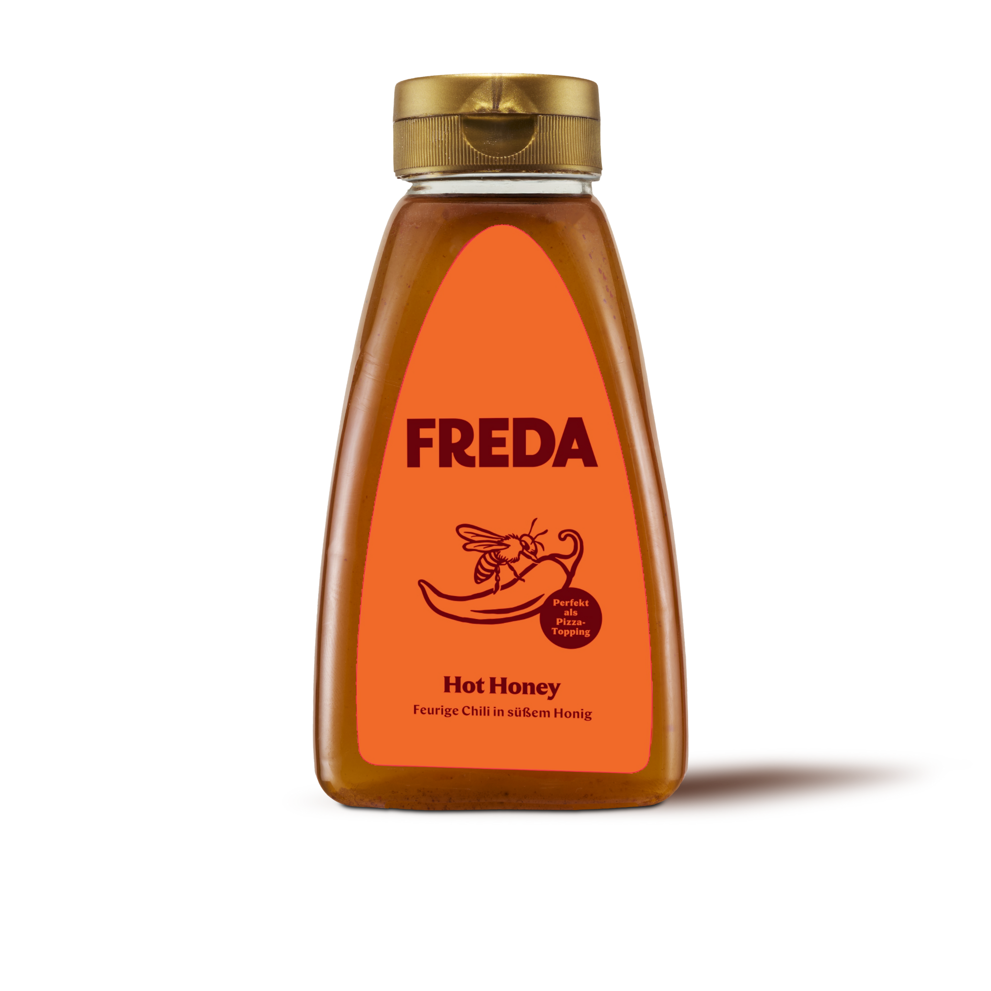 Braune Flasche mit orangem Etikett der Marke "FREDA", beschriftet als "Hot Honey" mit einer Biene und einer Chilischote.