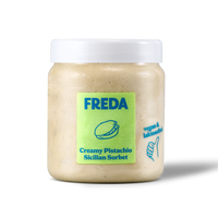 Ein Glas "FREDA" Creamy Pistachio Sicilian Sorbet, vegan und laktosefrei, mit grünem Etikett und weißem Deckel.