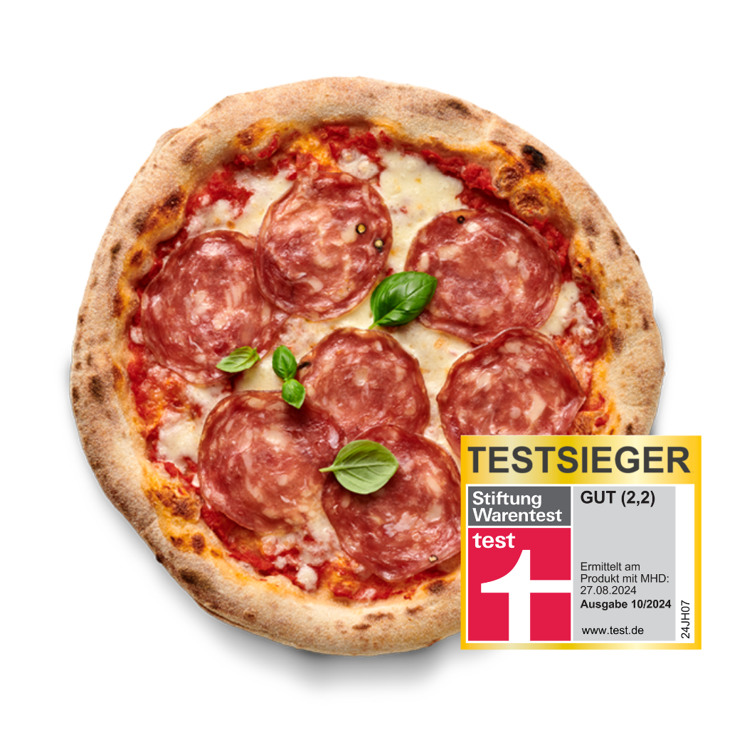 Pizza Salami mit Basilikumblättern, daneben ein Testsieger-Siegel von Stiftung Warentest mit der Bewertung "GUT (2,2)".